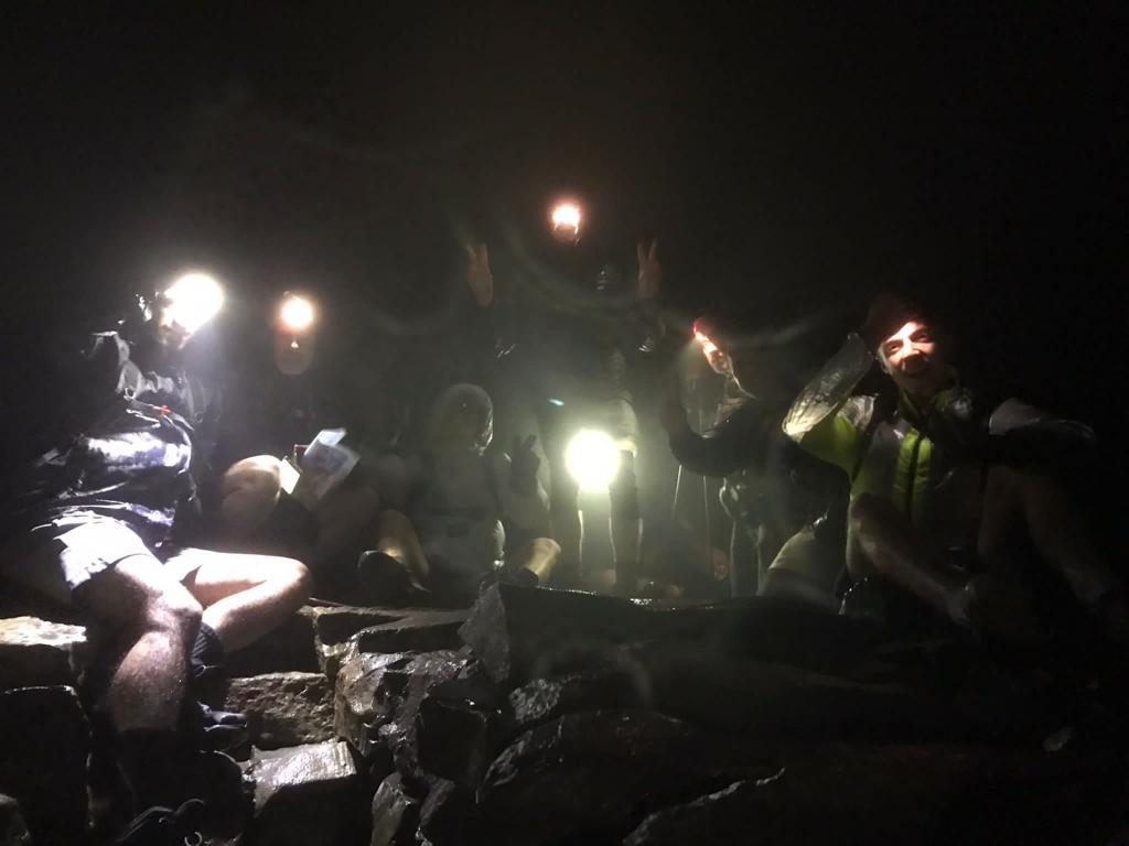 Head torches on at the Scafell Pike summit