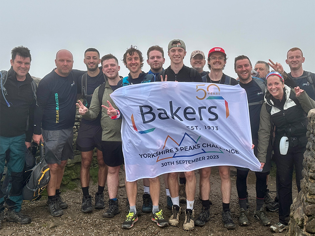 Group reach the summit of Pen-y-Ghent in the Yorkshire 3 Peaks