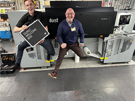 Jumping for joy at the install of the new Durst Tau RSC 340 LED